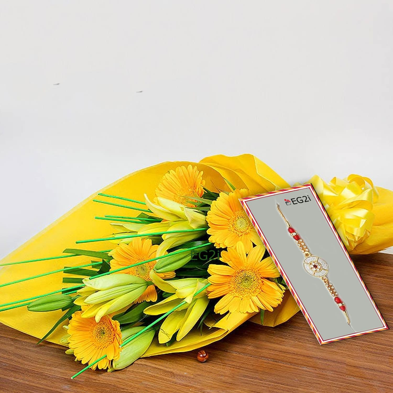 Gerbera and Lilies with Rakhi Roli Chawal