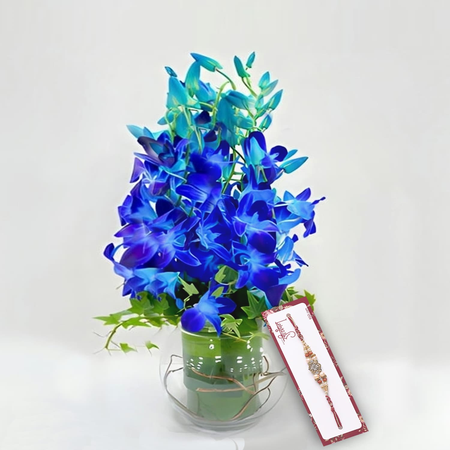 Blue Orchid in Glass Bowl with Rakhi Roli Chawal